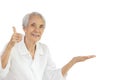 Senior people open the palm of hand on the empty copy space,elderly woman giving a thumb up gesture,symbol of likes,thumbs up for Royalty Free Stock Photo