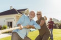 Senior people participating in rope pulling competition Royalty Free Stock Photo