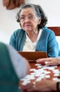 Senior people playing rummy Royalty Free Stock Photo