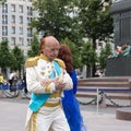 Senior people spend their leisure time dancing in the square
