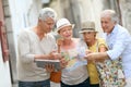 Senior people on a trip visiting monuments Royalty Free Stock Photo