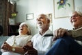 Senior people watching comedy show together Royalty Free Stock Photo