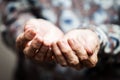 Senior person hands begging for food or help Royalty Free Stock Photo