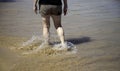 Person walking beach Royalty Free Stock Photo