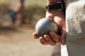 Senior playing petanque