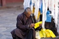 Senior prayer in Tibet