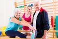 Senior at rehab in physical therapy Royalty Free Stock Photo