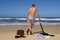 Senior retired business man undressing on caribbean beach, retirement freedom escape concept Royalty Free Stock Photo