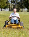 Senior man on zero turn lawn mower on turf Royalty Free Stock Photo