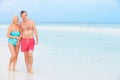 Senior Romantic Couple Walking In Beautiful Tropical Sea Royalty Free Stock Photo