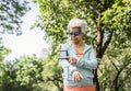 Senior runner using a fitness tracker Royalty Free Stock Photo