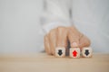 Hand choose red arrow up for business disruption and different thinking idea, business growing, stock market and economy Royalty Free Stock Photo