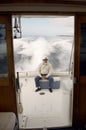 Senior Sailor Sitting On Yacht