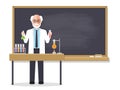 Senior science teacher teaching student in classroom Royalty Free Stock Photo