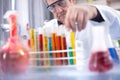 senior scientist with protective glasess researching in laboratory Royalty Free Stock Photo