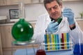 Senior scientist researching in laboratory Royalty Free Stock Photo