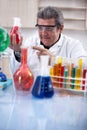 Senior scientist researching in laboratory Royalty Free Stock Photo