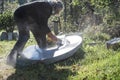 Senior sculptor polishing and shaping stone piece