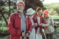 Senior serves as a guide for a group of amateur tourists Royalty Free Stock Photo