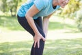 Senior sporty woman has knee pain