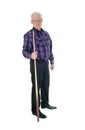 Senior standing with billiard cue. Royalty Free Stock Photo