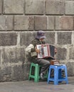 Senior Street Musician Playing the Accordion