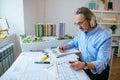 Senior successful architect or engineer working in office Royalty Free Stock Photo