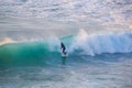 Senior surfer riding a perfect wave.