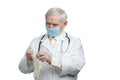 Senior surgeon put on gloves. Royalty Free Stock Photo