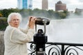 Senior surprised at niagara falls binoculars Royalty Free Stock Photo