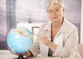 Senior teacher teaching geography