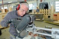 Senior technician repairing agriculture machinery