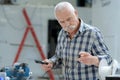 senior technician using screwdriver