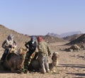Senior tourist on camel 1