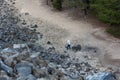 Senior Tourist at Obsidian Lava Flow in Oregon