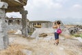 Senior tourist woman making pictures of landmark attractions