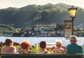 Senior tourists in Italy waiting for the ferry boat to San Giulio island Orta Lake