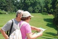 Senior tourists with map Royalty Free Stock Photo