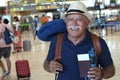 Senior traveler holding his passport