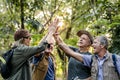 Senior trekkers giving a high five Royalty Free Stock Photo