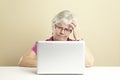 Senior using laptop Royalty Free Stock Photo