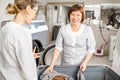 Senior washwoman in the laundry