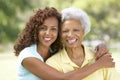 Senior Woman With Adult Daughter In Park Royalty Free Stock Photo