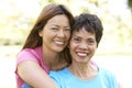 Senior Woman With Adult Daughter In Park Royalty Free Stock Photo