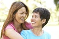 Senior Woman With Adult Daughter In Park Royalty Free Stock Photo