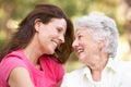 Senior Woman With Adult Daughter In Park