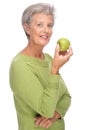 Senior woman with apple