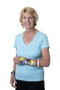 Senior woman with arm in painted cast Royalty Free Stock Photo