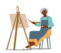 Senior Woman Artist Hold Paintbrush in Hand in Front of Canvas on Easel Drawing Picture. Aged African Lady Hobby Royalty Free Stock Photo