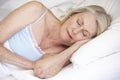 Senior Woman Asleep In Bed